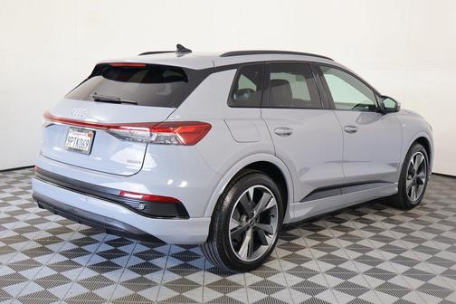 Pebble Gray 2024 Audi Q4 e-tron Premium 55 quattro