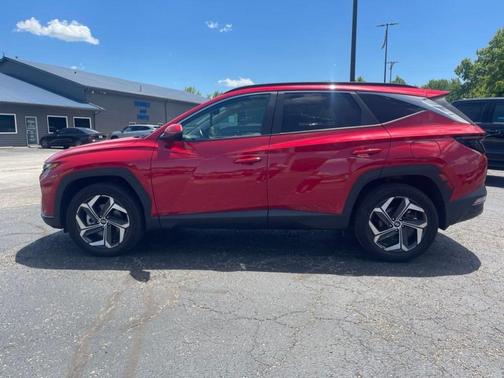 Red 2023 Hyundai TUCSON SEL