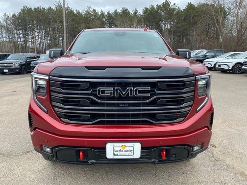 Volcanic Red Tintcoat 2026 GMC Sierra 1500 AT4