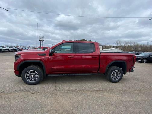 Volcanic Red Tintcoat 2026 GMC Sierra 1500 AT4