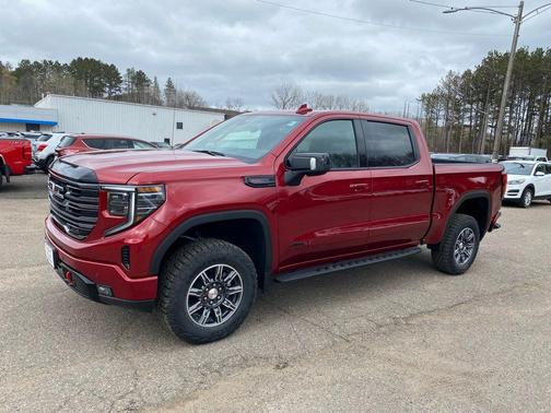 Volcanic Red Tintcoat 2026 GMC Sierra 1500 AT4