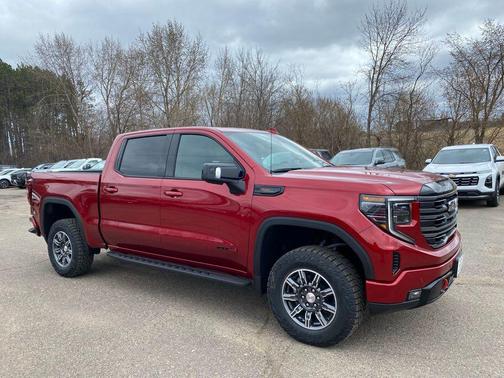 Volcanic Red Tintcoat 2026 GMC Sierra 1500 AT4