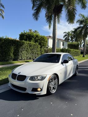 White 2013 BMW 335 is