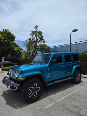 Green 2024 Jeep Wrangler Sahara