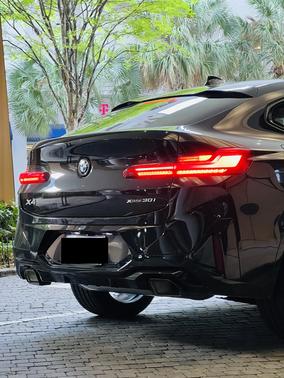 Black 2023 BMW X4 xDrive30i