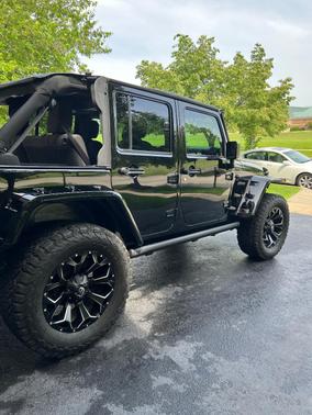 Black 2017 Jeep Wrangler Unlimited Sport