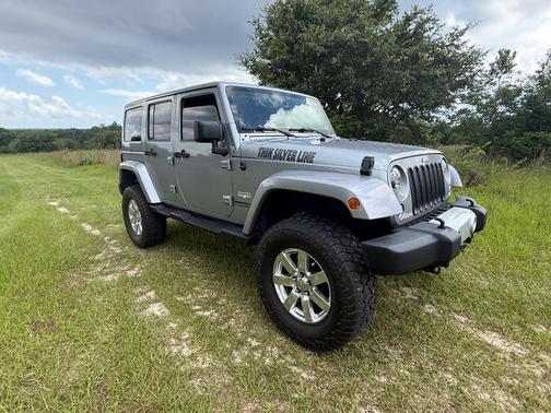 Silver 2014 Jeep Wrangler Unlimited Sahara