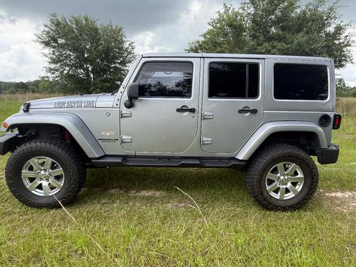 Silver 2014 Jeep Wrangler Unlimited Sahara