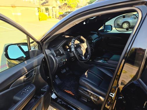 Black 2025 Honda Passport TrailSport