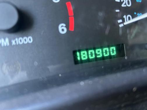Yellow 2000 Jeep Wrangler Sport