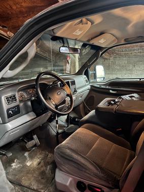 Red 2003 Ford F-250 XLT Crew Cab Super Duty