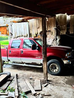 Red 2003 Ford F-250 XLT Crew Cab Super Duty
