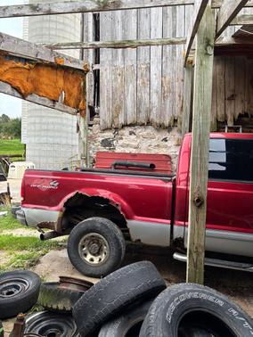 Red 2003 Ford F-250 XLT Crew Cab Super Duty