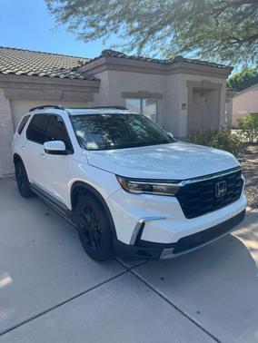 White 2025 Honda Pilot Elite AWD