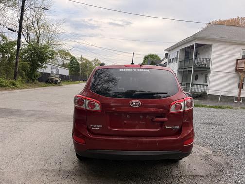 Red 2011 Hyundai SANTA FE GLS