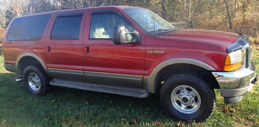 Red 2000 Ford Excursion Limited 4WD
