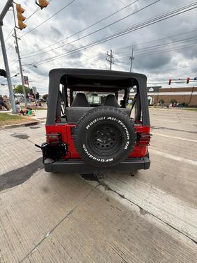 Red 1997 Jeep Wrangler SE