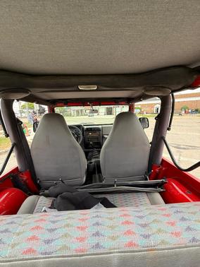 Red 1997 Jeep Wrangler SE