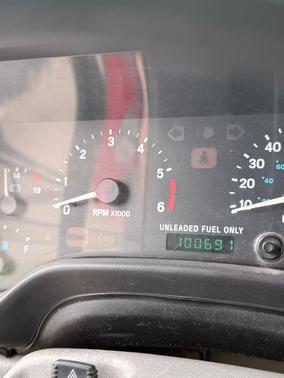 Red 1997 Jeep Wrangler SE