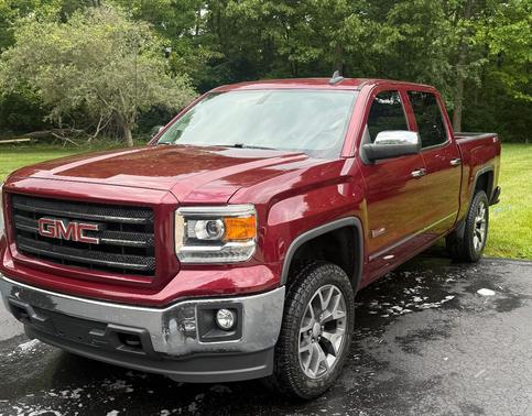 Red 2015 GMC Sierra 1500 SLE