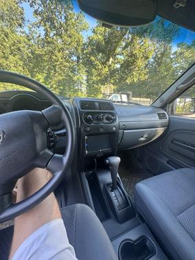 Yellow 2003 Nissan Xterra XE