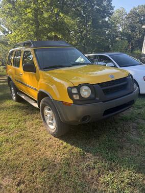Yellow 2003 Nissan Xterra XE