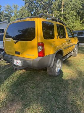 Yellow 2003 Nissan Xterra XE