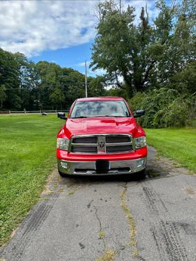 Red 2011 Dodge Ram 1500 SLT