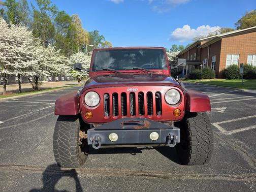 Red 2007 Jeep Wrangler Unlimited Sahara