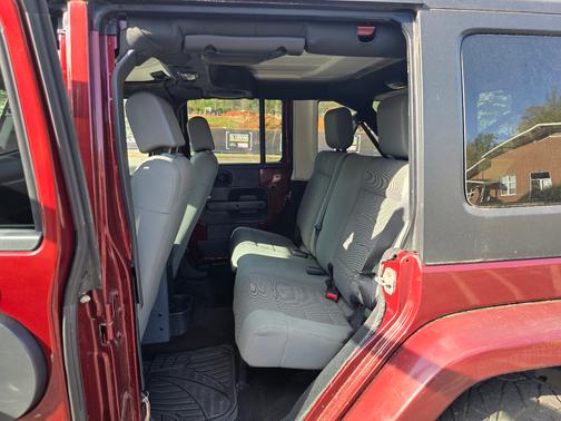 Red 2007 Jeep Wrangler Unlimited Sahara