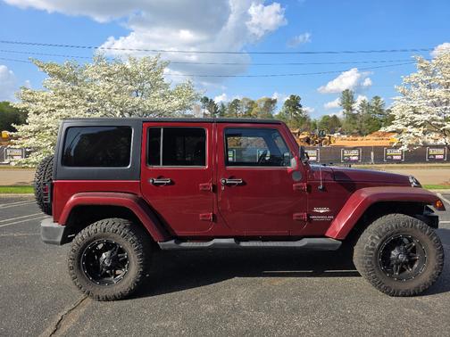 Red 2007 Jeep Wrangler Unlimited Sahara