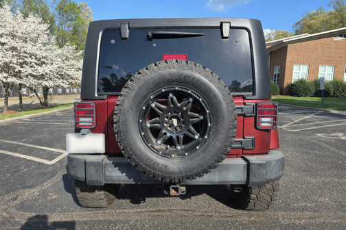 Red 2007 Jeep Wrangler Unlimited Sahara