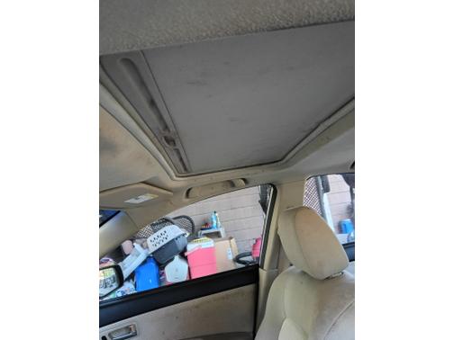 Beige 2006 Mazda Mazda3 i Touring