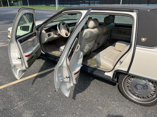 Beige 1996 Cadillac DeVille Base