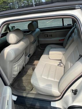 Beige 1996 Cadillac DeVille Base