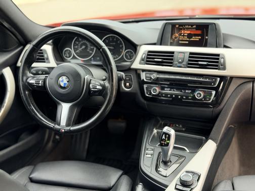 Red 2016 BMW 320 i