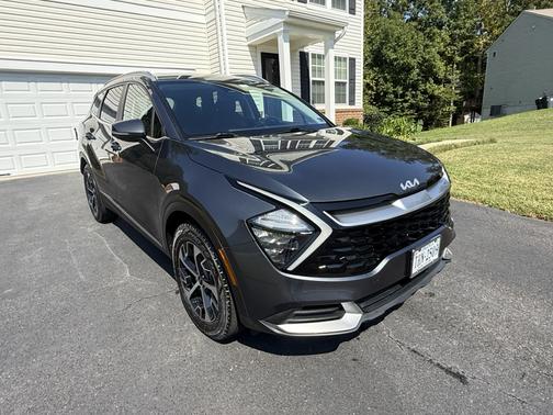 Gray 2023 Kia Sportage Hybrid EX