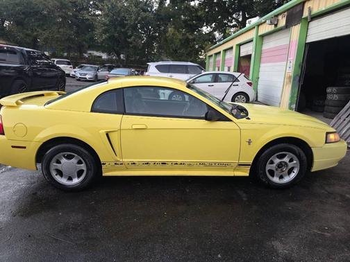Yellow 2001 Ford Mustang Base