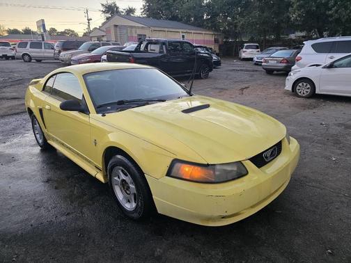 Yellow 2001 Ford Mustang Base