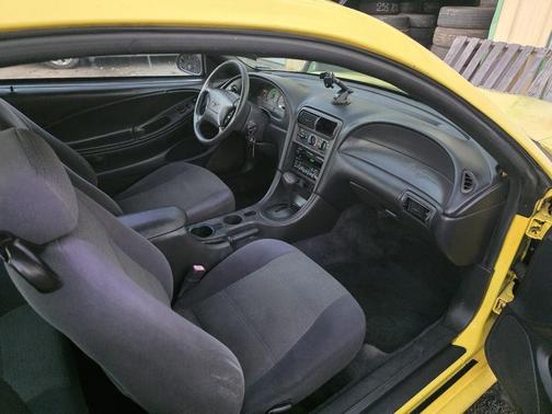 Yellow 2001 Ford Mustang Base