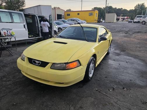 Yellow 2001 Ford Mustang Base