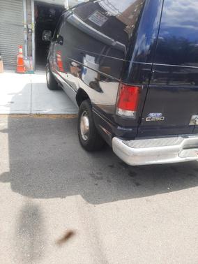 Blue 2000 Ford E250 Base