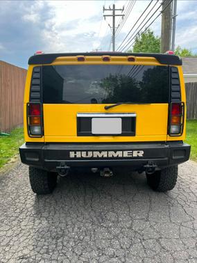 Yellow 2003 Hummer H2 Base