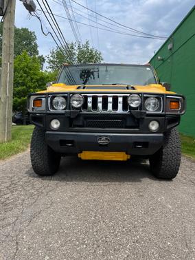 Yellow 2003 Hummer H2 Base