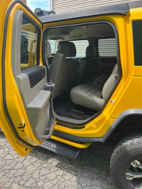 Yellow 2003 Hummer H2 Base