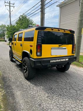 Yellow 2003 Hummer H2 Base