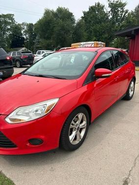 Red 2014 Ford Focus SE
