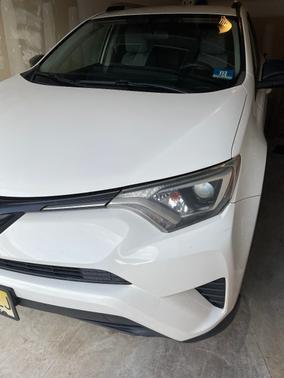 White 2016 Toyota RAV4 LE
