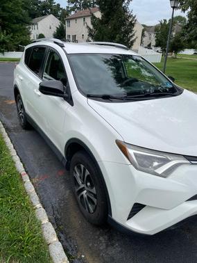 White 2016 Toyota RAV4 LE