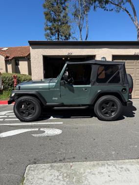 Green 1999 Jeep Wrangler SE
